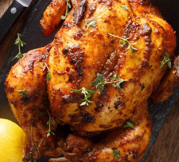 what temperature to bake whole chicken