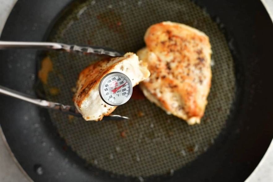 What temperature to fry chicken on electric stove